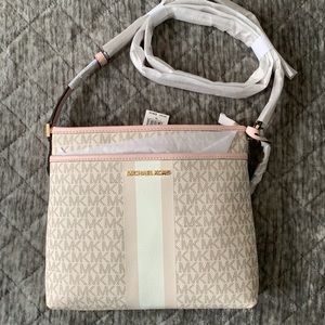 Beautiful White and Pink crossbody by Michael Kors